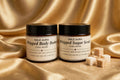 The Luminous Duo — both Solé Aura jars together, gold silk background with sugar cubes